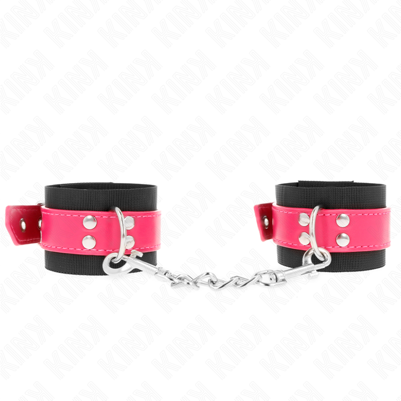 KINK - BLACK NYLON WRIST RESTRAINTS WITH ADJUSTABLE RASPBERRY PINK FAUX LEATHER BELT 19-29 CM X 5.1 CM
