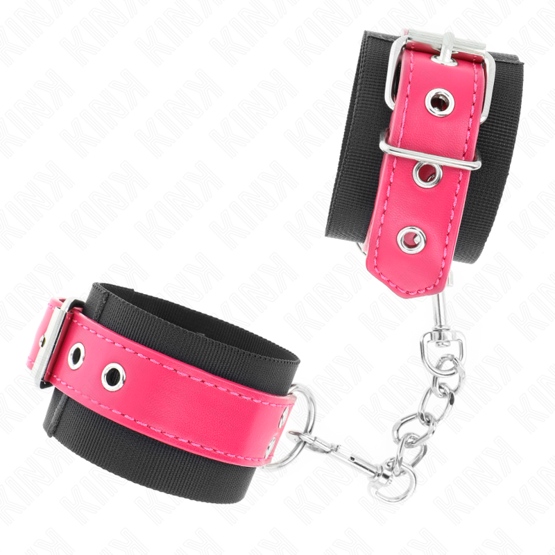 KINK - BLACK NYLON WRIST RESTRAINTS WITH ADJUSTABLE RASPBERRY PINK FAUX LEATHER BELT 19-29 CM X 5.1 CM